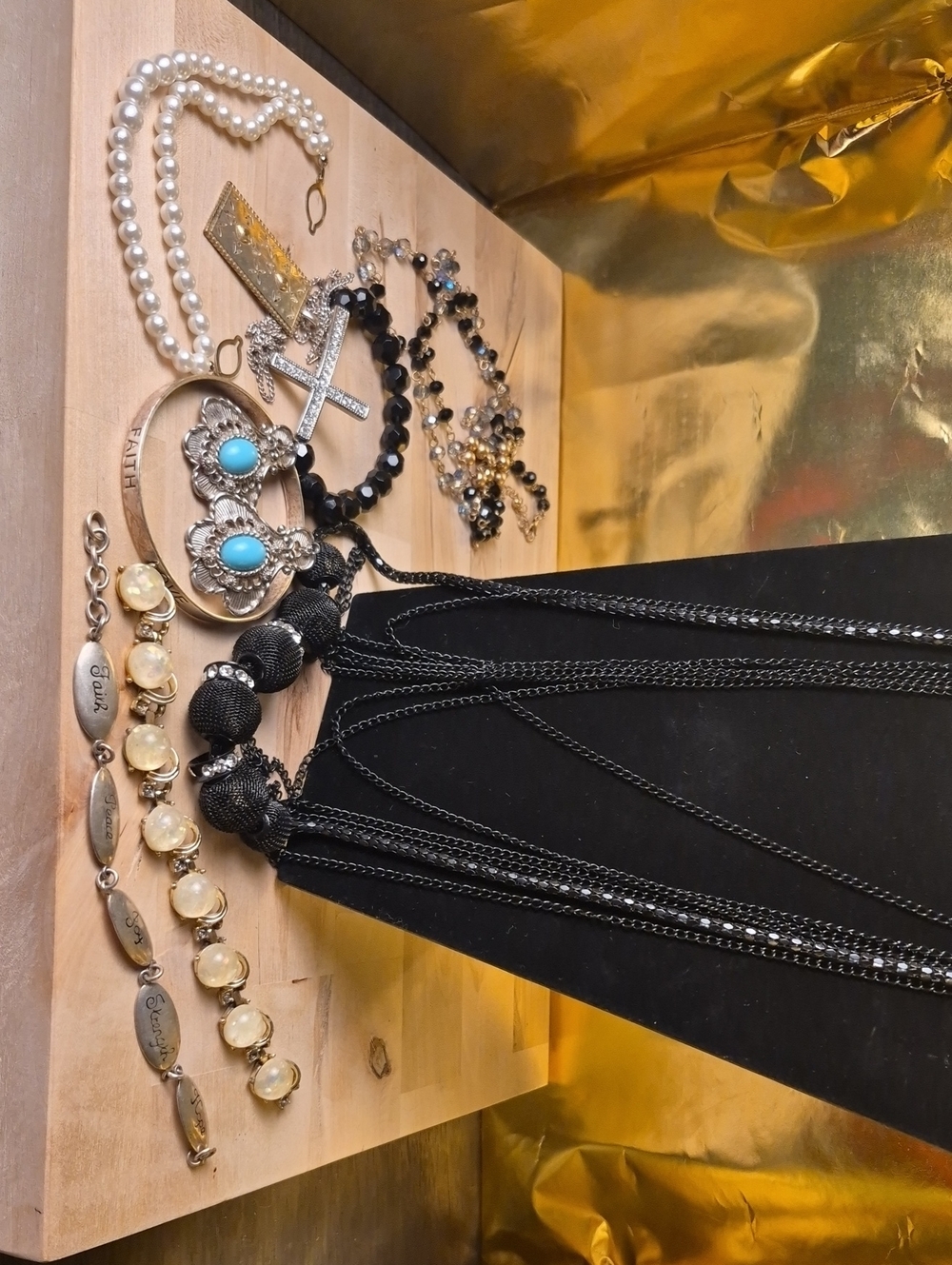 LK Black Multi-Strand Necklace with Mixed Accent Charms